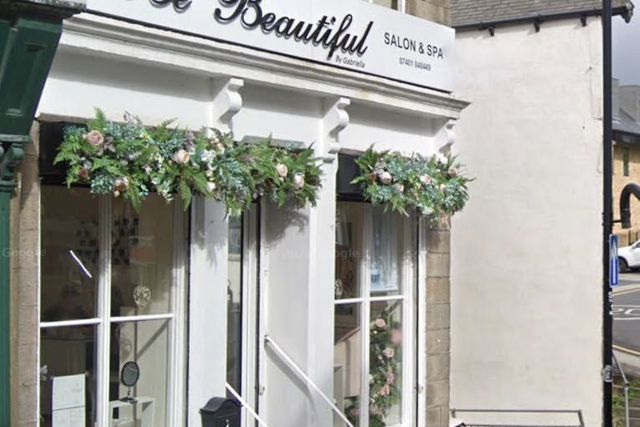 The Be Beautiful salon shopfront at 1 Ivegate, decorated with flowers